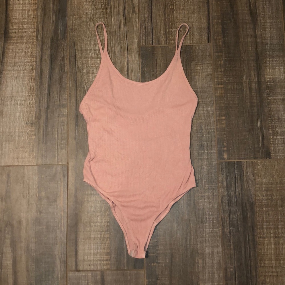 Baby pink body suit